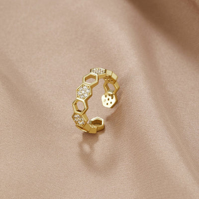 Prsten s saćem od zlata i kristala